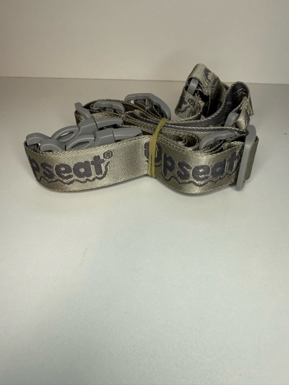 Upseat Adjustable Strap Gray Never Been used. New